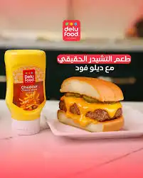 ديلو فوودد صوص الشيدر عصارة 310غ